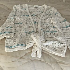 Knitted sweater. Ties at waist. Open front. S